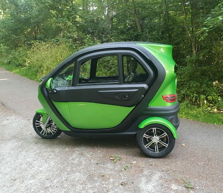 groene trike jdm invalidenvoertuig city